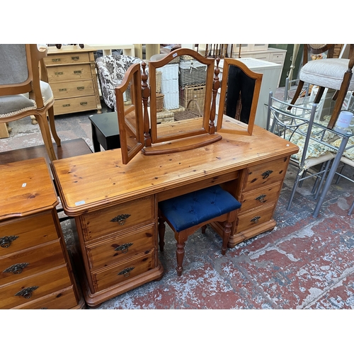 137 - A pine dressing table, mirror and stool - approx. 73cm high x 144cm wide x 46cm deep