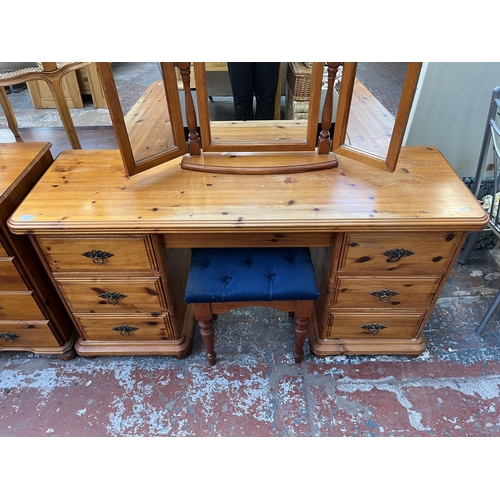 137 - A pine dressing table, mirror and stool - approx. 73cm high x 144cm wide x 46cm deep