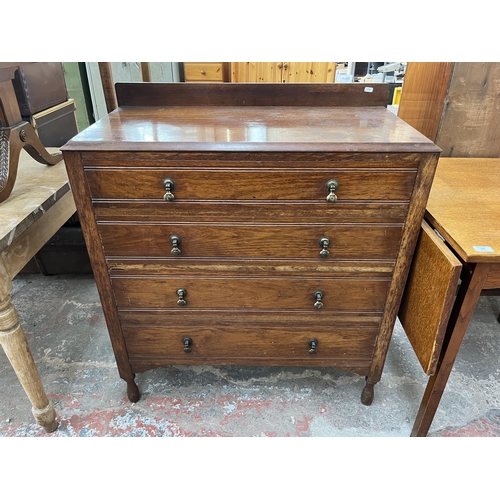 147 - An early 20th century mahogany chest of drawers - approx. 103cm high x 91cm wide x 45cm deep