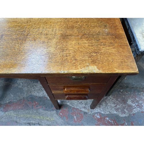 149 - A 1950s oak office desk - approx. 77cm high x 106cm wide not extended x 71cm deep