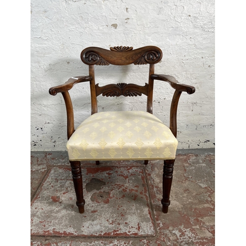 151 - A 19th century carved elm and fabric upholstered carver chair - approx. 88cm high x 66cm wide x 46cm... 