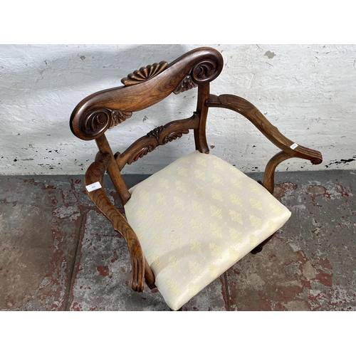 151 - A 19th century carved elm and fabric upholstered carver chair - approx. 88cm high x 66cm wide x 46cm... 