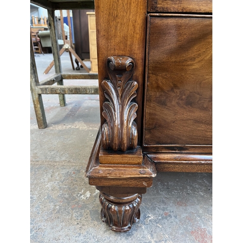 154 - A Victorian mahogany chest of drawers with carved acanthus leaf design - approx. 140cm high x 133cm ... 