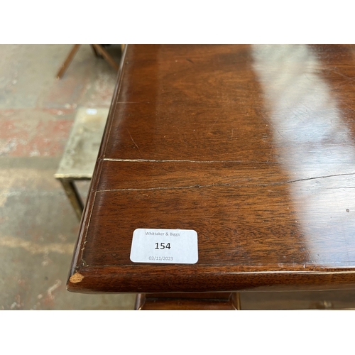 154 - A Victorian mahogany chest of drawers with carved acanthus leaf design - approx. 140cm high x 133cm ... 