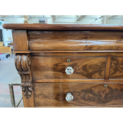 154 - A Victorian mahogany chest of drawers with carved acanthus leaf design - approx. 140cm high x 133cm ... 