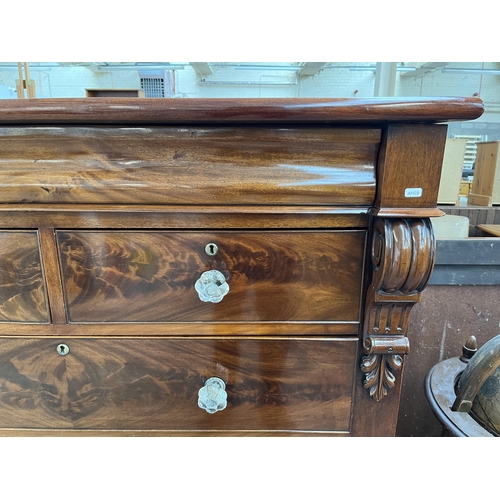 154 - A Victorian mahogany chest of drawers with carved acanthus leaf design - approx. 140cm high x 133cm ... 