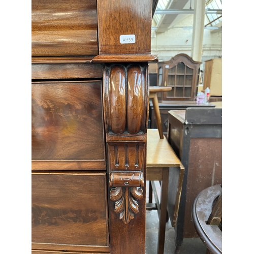 154 - A Victorian mahogany chest of drawers with carved acanthus leaf design - approx. 140cm high x 133cm ... 