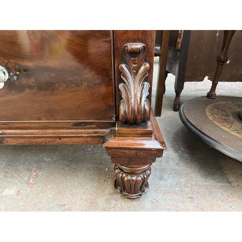 154 - A Victorian mahogany chest of drawers with carved acanthus leaf design - approx. 140cm high x 133cm ... 