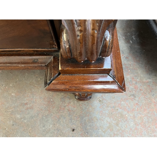 154 - A Victorian mahogany chest of drawers with carved acanthus leaf design - approx. 140cm high x 133cm ... 