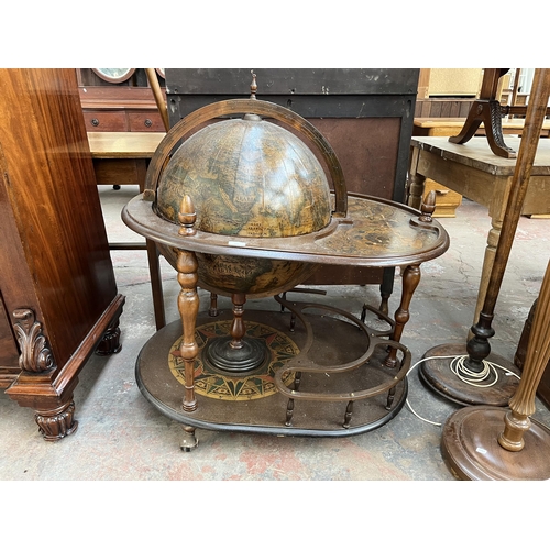 155 - A mid 20th century terrestrial globe drinks trolley