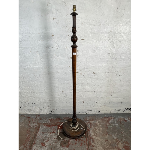 156 - A mid 20th century beech standard lamp with circular base - approx. 160cm high