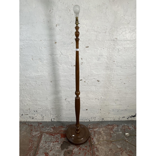 157 - A Nathan teak standard lamp with circular base - approx. 160cm high