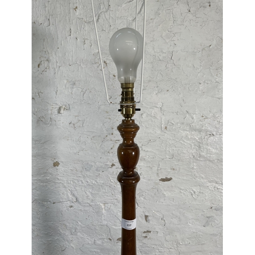 157 - A Nathan teak standard lamp with circular base - approx. 160cm high