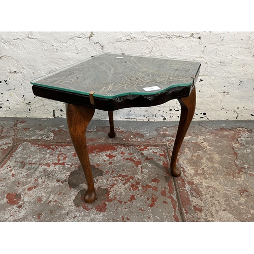 159 - A wooden and glass top printing block side table - approx. 42cm high x 54cm wide x 45cm deep