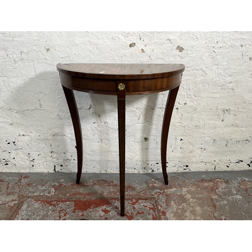 160 - A 19th century style mahogany half moon console table with gilt metal decoration - approx. 70cm high... 