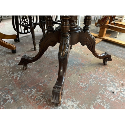 161 - A Victorian inlaid walnut oval tilt top loo table on quatrefoil base - approx. 73cm high x 94cm wide... 