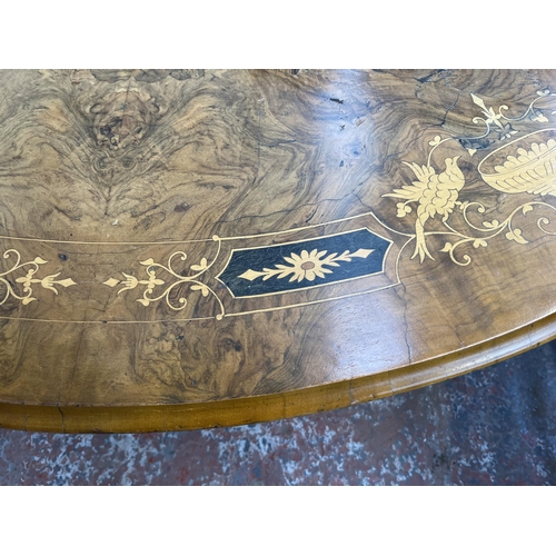 161 - A Victorian inlaid walnut oval tilt top loo table on quatrefoil base - approx. 73cm high x 94cm wide... 