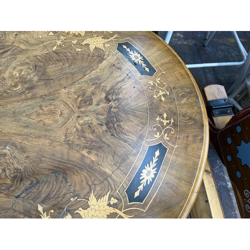 161 - A Victorian inlaid walnut oval tilt top loo table on quatrefoil base - approx. 73cm high x 94cm wide... 