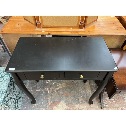 165 - A modern black painted two drawers console table - approx. 76cm high x 80cm wide x 40cm deep