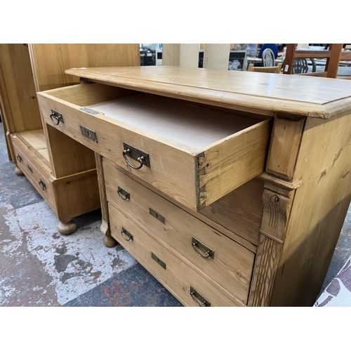 173 - An Art Nouveau pine chest of drawers - approx. 91cm high x 106cm wide x 54cm deep
