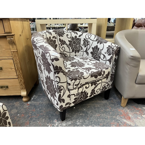 174 - A modern floral fabric upholstered armchair and footstool