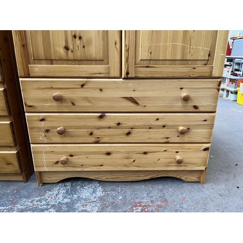 180 - A pine double wardrobe - approx. 178cm high x 103cm wide x 58cm deep