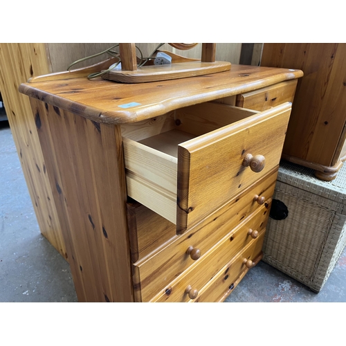 181 - A pine chest of drawers and dressing table mirror - approx. 97cm high x 80cm wide x 40cm deep