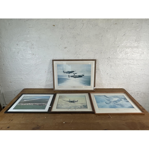 221 - Four framed aviation prints to include two Robert Taylor signed prints