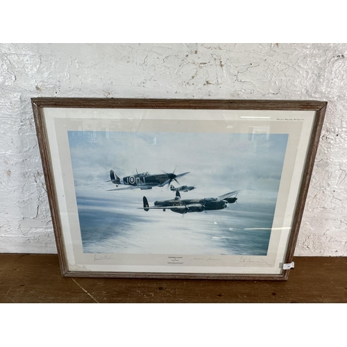 221 - Four framed aviation prints to include two Robert Taylor signed prints