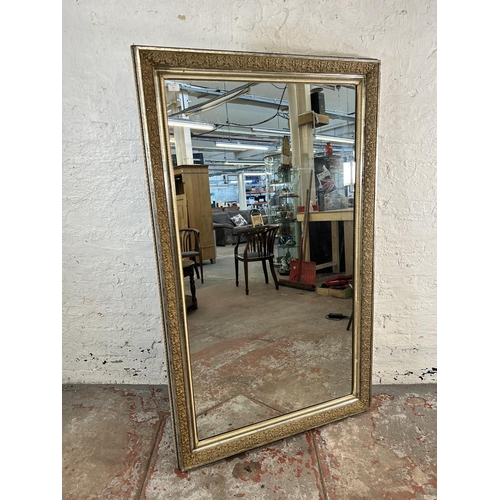 10 - A late 19th century French gesso framed wall mirror - approx. 165cm x 100cm