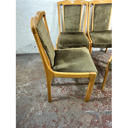 16 - Four mid 20th century East German beech and fabric upholstered dining chairs