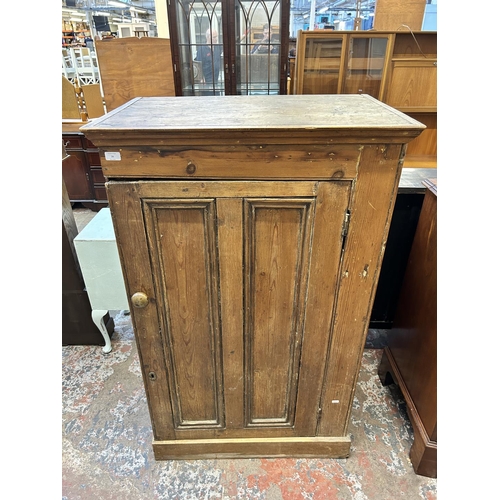 26 - A Victorian pine single door cupboard - approx. 135cm high x 83cm wide x 52cm deep