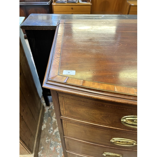 27 - A Georgian mahogany bow fronted chest of drawers on bracket supports with satinwood and ebony crossb... 