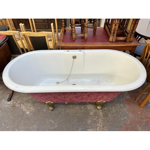 44 - A Victorian style plastic bath with gold painted ball and claw supports - approx. 63cm high x 80cm w... 