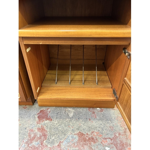 55 - Two Parker Knoll Nathan teak cabinets - approx. 75cm high x 52cm wide x 45cm deep