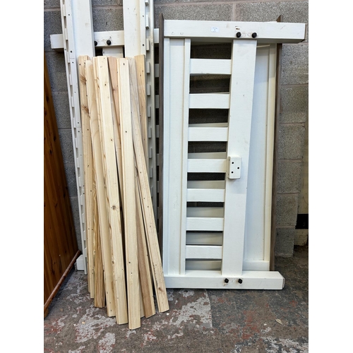 6 - A PGT Reclaimed white painted and reclaimed hardwood king size bed frame