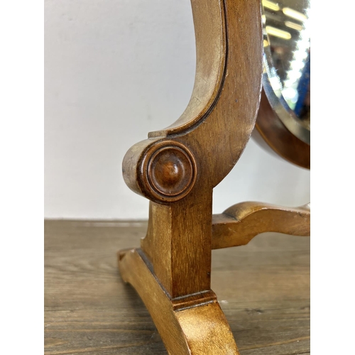 64 - An Edwardian satinwood inlaid walnut framed shield shaped bevelled edge dressing table mirror - appr... 