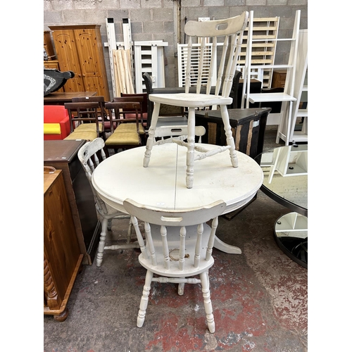 71 - A Victorian style painted pine circular extending dining table and four chairs - approx. 78cm high x... 