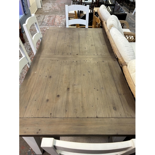 74 - A PGT Reclaimed white painted and reclaimed hardwood rectangular dining table and four chairs - appr... 