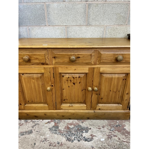 8 - A Victorian style solid pine sideboard - approx. 81cm high x 122cm wide x 46cm deep