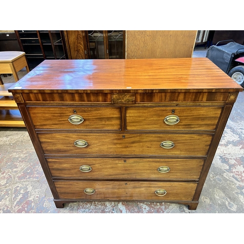 87 - A Georgian inlaid mahogany chest of drawers on bracket supports - approx. 114cm high x 121cm wide x ... 