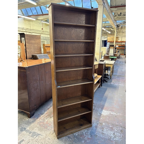 88 - A pine eight tier free standing bookcase - approx. 207cm high x 71cm wide x 22cm deep