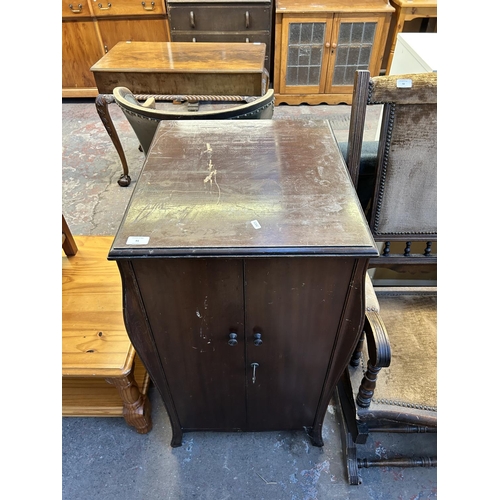 91 - A 1930s His Masters Voice mahogany two door record cabinet with fitted interior - approx. 90cm high ... 