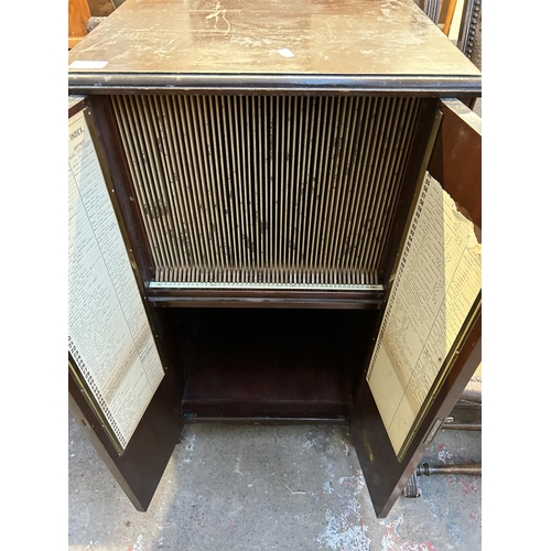 91 - A 1930s His Masters Voice mahogany two door record cabinet with fitted interior - approx. 90cm high ... 