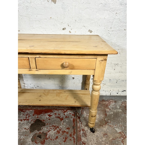 93 - A Victorian pine two drawer wash stand/console table - approx. 73cm high x 95cm wide x 52cm deep