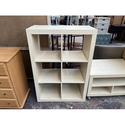 185 - Four pieces of modern furniture, oak effect and white laminate side table, two IKEA Kallax shelving ... 