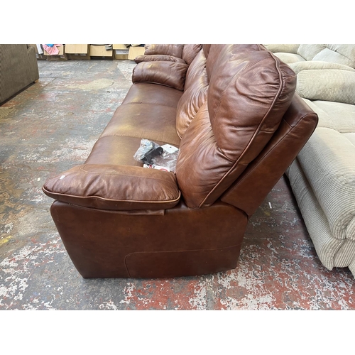 194 - A G Plan brown leather three piece lounge suite comprising two armchairs and three seater sofa - app... 