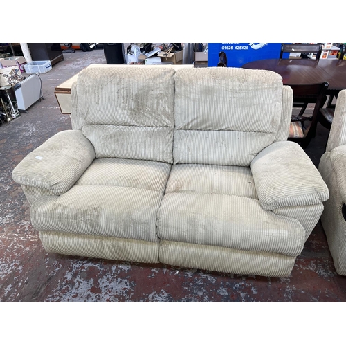 195 - Two modern beige fabric upholstered reclining two seater sofas - approx. 100cm high x 157cm wide x 9... 