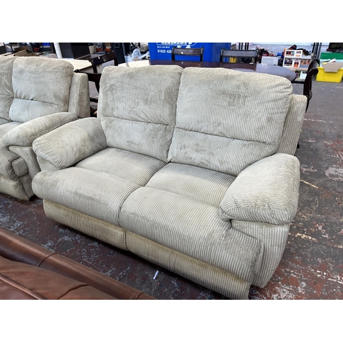 195 - Two modern beige fabric upholstered reclining two seater sofas - approx. 100cm high x 157cm wide x 9... 