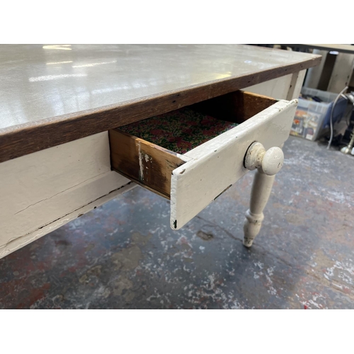 196 - A Victorian painted pine farmhouse dining table with later added top - approx. 73cm high x 86cm wide... 